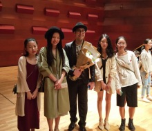 Chinese fans taking photos with Carlo Aspri after his performance in Xiamen city, Fujian Province, China.