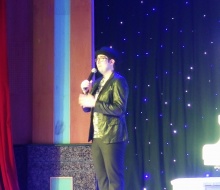 Carlo Aspri talking to the crowd and entertaining them at one of his performances in Jiujiang, China.