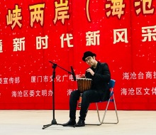 Carlo Aspri giving a "Djembe percussion" performance to a crowd of over 10,000 spectators, in Xiamen city, Fujian Province, China.