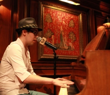 Carlo Aspri sings his music compositions at a private event for the wealthy in Beijing, China.