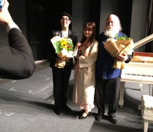 Carlo Aspri and famous Swiss pianist Werner Bärtschi taking photos with fans in Wuxi, China.