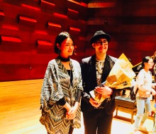 After Carlo Aspri's performance in Xiamen city, Fujian Province, China, fans come on stage to take photos with him.