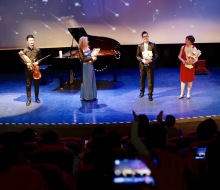 Carlo Aspri performs as the male leading role in the drama concert "City Of Stars" at the "Sky Theater" in Shanghai, China. Carlo as well as the other performers ( Li Nong, Nicola), and the director and writer of the drama concert (Hua Yinghong), all stand on center stage as the audience gives them a standing ovation and applauds the artists for their successful performance.