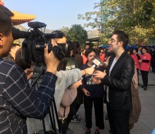 Carlo Aspri interviewed by all the medias after his amazing performance of the famous Chinese song "The Waves Of Gulangyu" at an exclusive Buddhist Temple in Xiamen city, Fujian, China. Over 5,000 spectators and medias all attended to see Carlo's performance.
