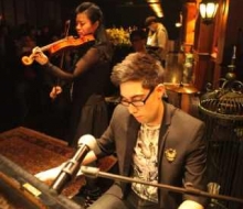 Carlo Aspri performs at the high-end exclusive club "East Wine Cellar" in Beijing, China. In this photo, Carlo is performing with the accomplished violinist Maggie Ma.